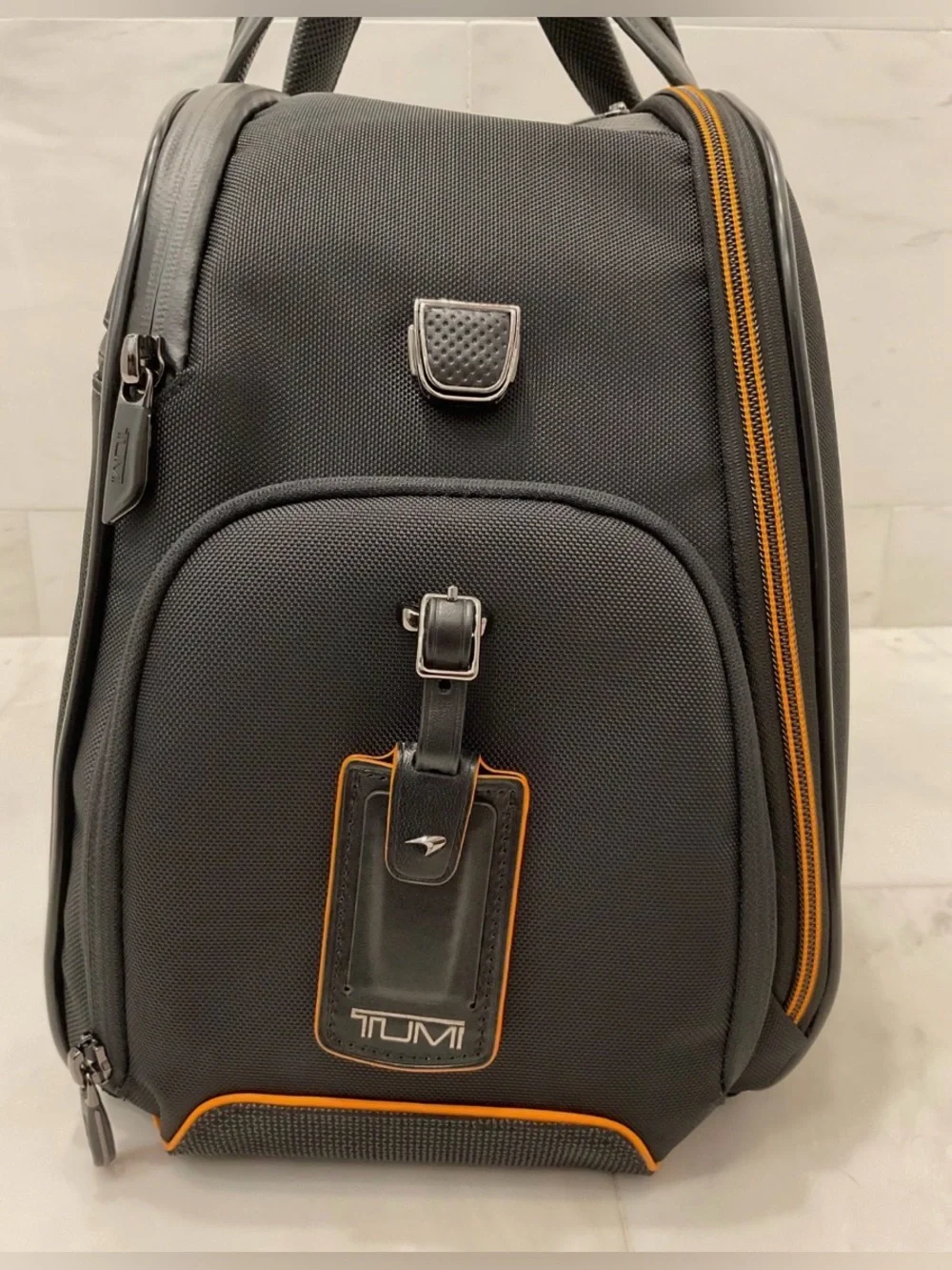 NEW Tumi McLaren QUANTUM 21.5” Duffel Bag - BLACK with PAPAYA ORANGE Accents
